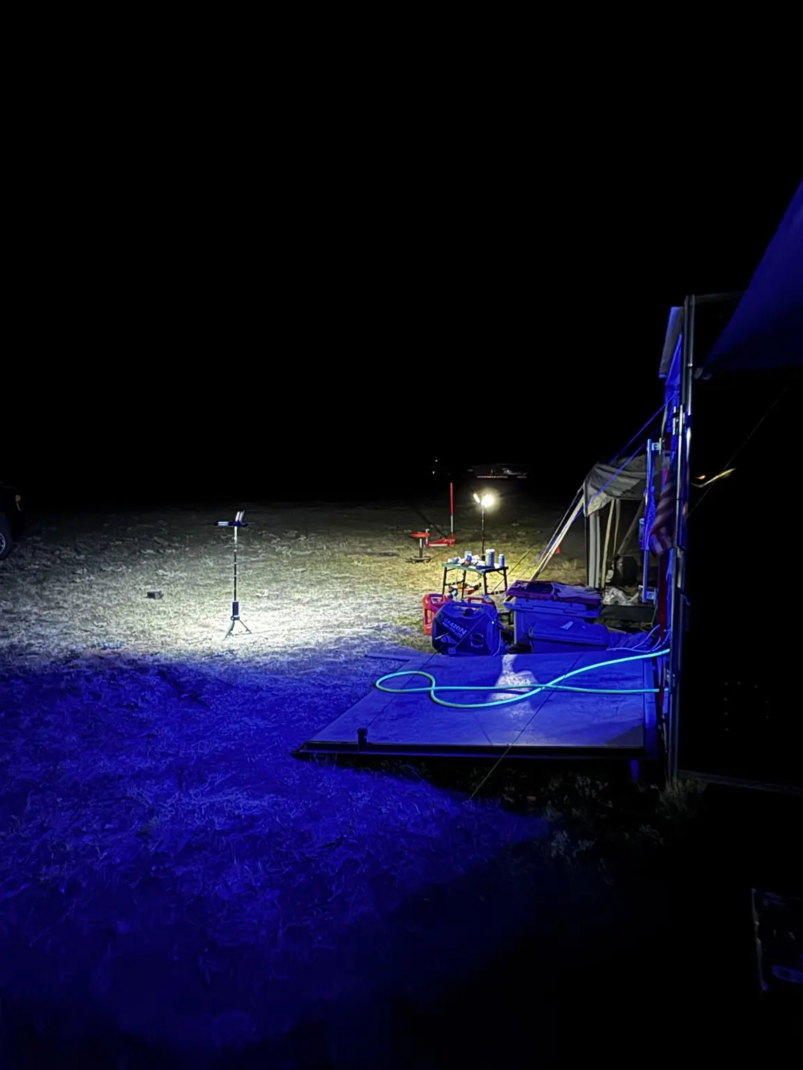 LB Off-Road Works mobile powersports service trailer operating at night in Colorado