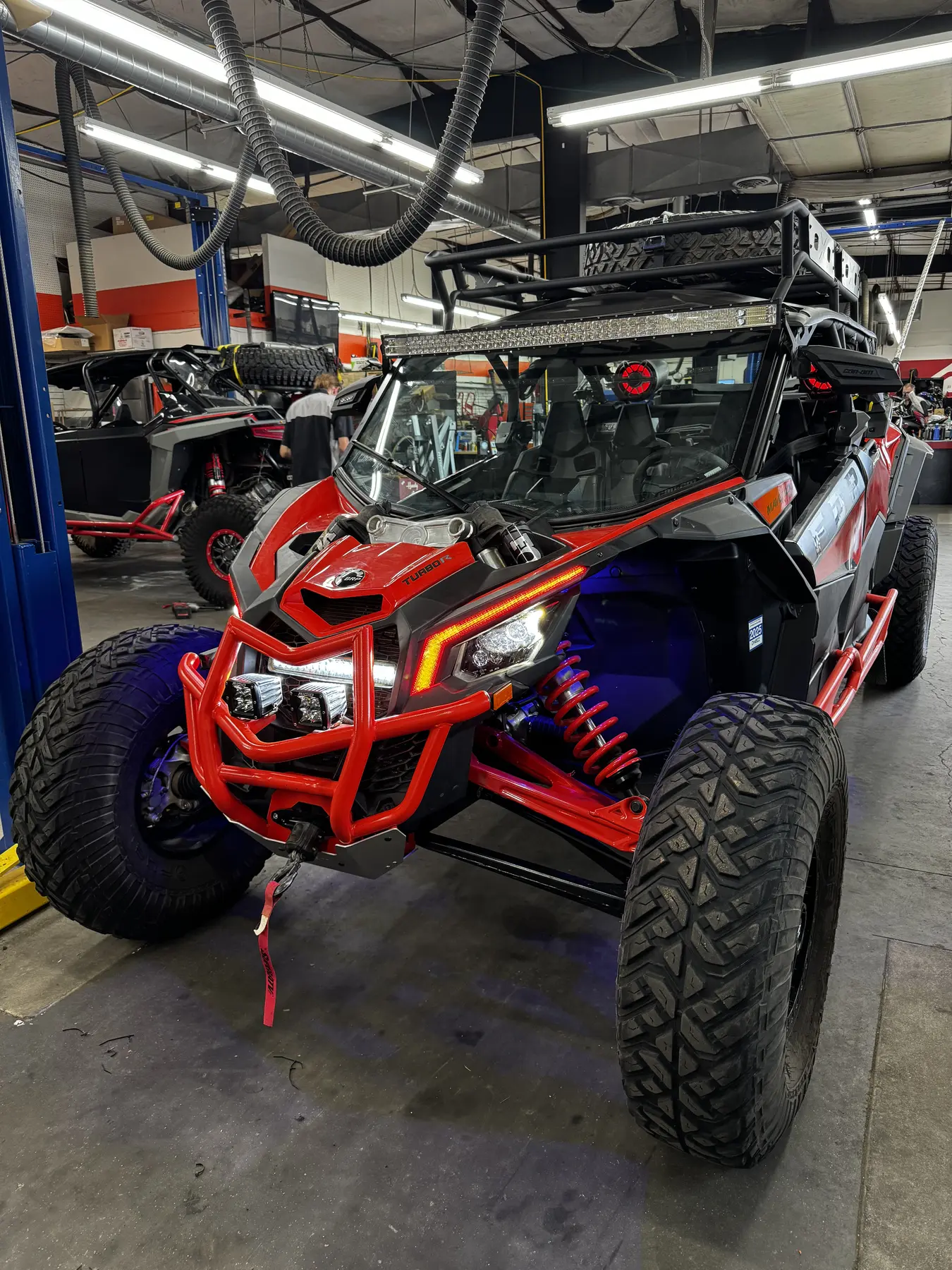 Red Can-Am Maverick X3 service work